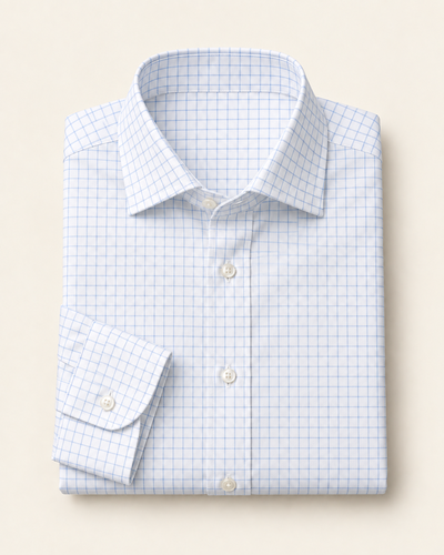 Illustrative white dress shirt with a fine blue check pattern, folded to show the collar and cuff.